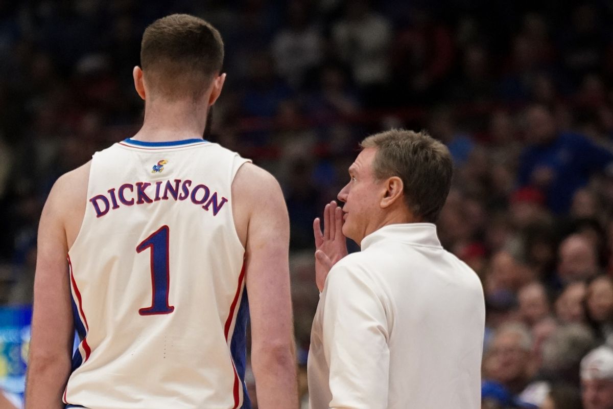 Kansas Jayhawks center Hunter Dickinson (1) talks with head coach Bill Self against the Cincinnati Bearcats during the first half at Allen Fieldhouse. Mandatory Credit: Denny Medley-Imagn Images