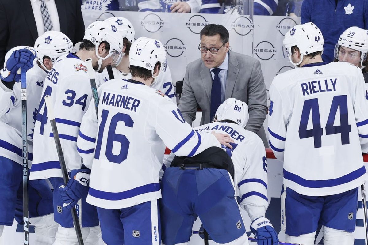 Jan 27, 2024; Winnipeg, Manitoba, CAN; Toronto Maple Leafs assistant coach Guy Boucher talks over a play in the third period against the Winnipeg Jets at Canada Life Centre. Mandatory Credit: James Carey Lauder-USA TODAY Sports