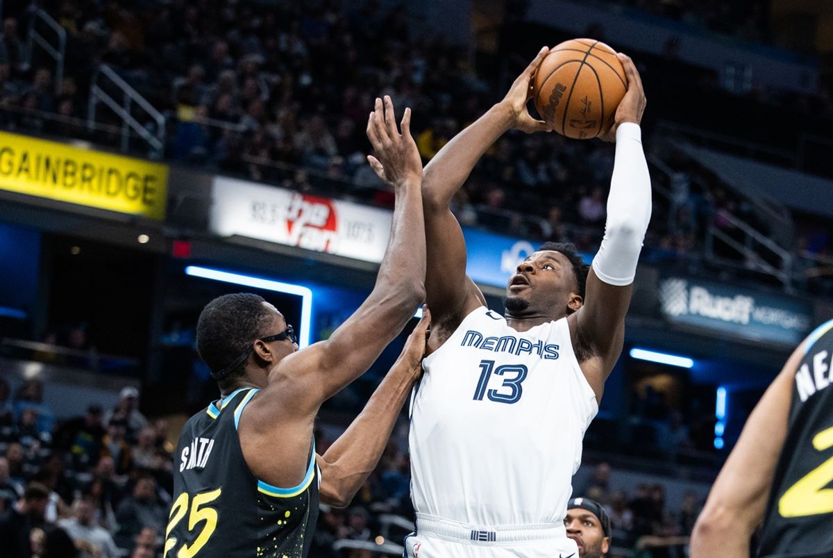 Jan 28, 2024; Indianapolis, Indiana, USA; Memphis Grizzlies forward Jaren Jackson Jr. (13) shoots the ball while Indiana Pacers forward Jalen Smith (25) defends in the first half at Gainbridge Fieldhouse. Mandatory Credit: Trevor Ruszkowski-Imagn Images