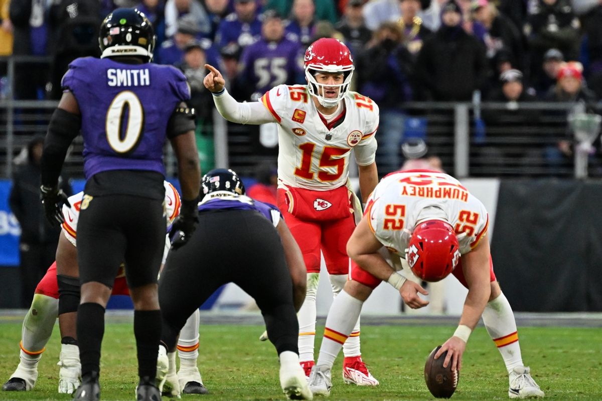 Jan 28, 2024; Baltimore, Maryland, USA; Kansas City Chiefs quarterback Patrick Mahomes (15) signals before a snap against the Baltimore Ravens during the second half in the AFC Championship football game at M&T Bank Stadium. Mandatory Credit: Tommy Gilligan-Imagn Images