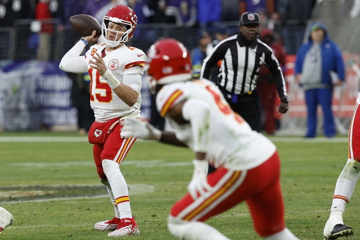 Jan 28, 2024; Baltimore, Maryland, USA; Kansas City Chiefs quarterback Patrick Mahomes (15) passes the ball to Chiefs wide receiver Rashee Rice (4) against the Baltimore Ravens in the AFC Championship football game at M&T Bank Stadium. Mandatory Credit: Geoff Burke-USA TODAY Sports
