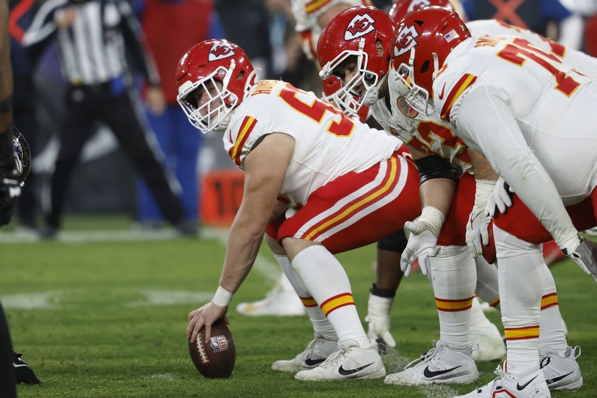 Jan 28, 2024; Baltimore, Maryland, USA; Kansas City Chiefs center Creed Humphrey (52) prepares to snap the ball against the Baltimore Ravens in the AFC Championship football game at M&T Bank Stadium. Mandatory Credit: Geoff Burke-USA TODAY Sports