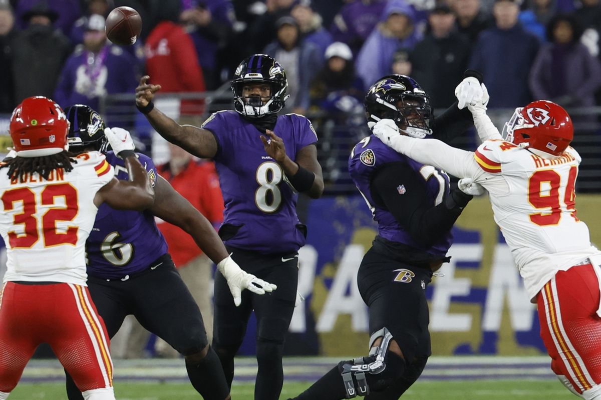 Jan 28, 2024; Baltimore, Maryland, USA; Baltimore Ravens quarterback Lamar Jackson (8) passes the ball against the Kansas City Chiefs in the AFC Championship football game at M&T Bank Stadium. Mandatory Credit: Geoff Burke-USA TODAY Sports