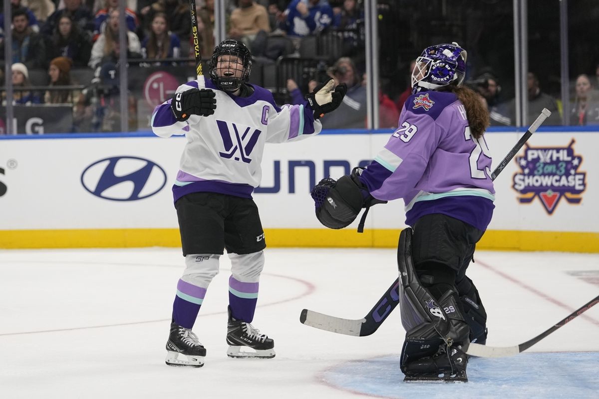 Feb 1, 2024; Toronto, Ontario, CANADA; Team King forward Kendall Coyne Schofield (26) celebrates her goal against Team Kloss goaltender Nicole Hensley (29) during the PWHL 3-on-3 Showcase during NHL All-Star Thursday at Scotiabank Arena. Mandatory Credit: John E. Sokolowski-Imagn Images