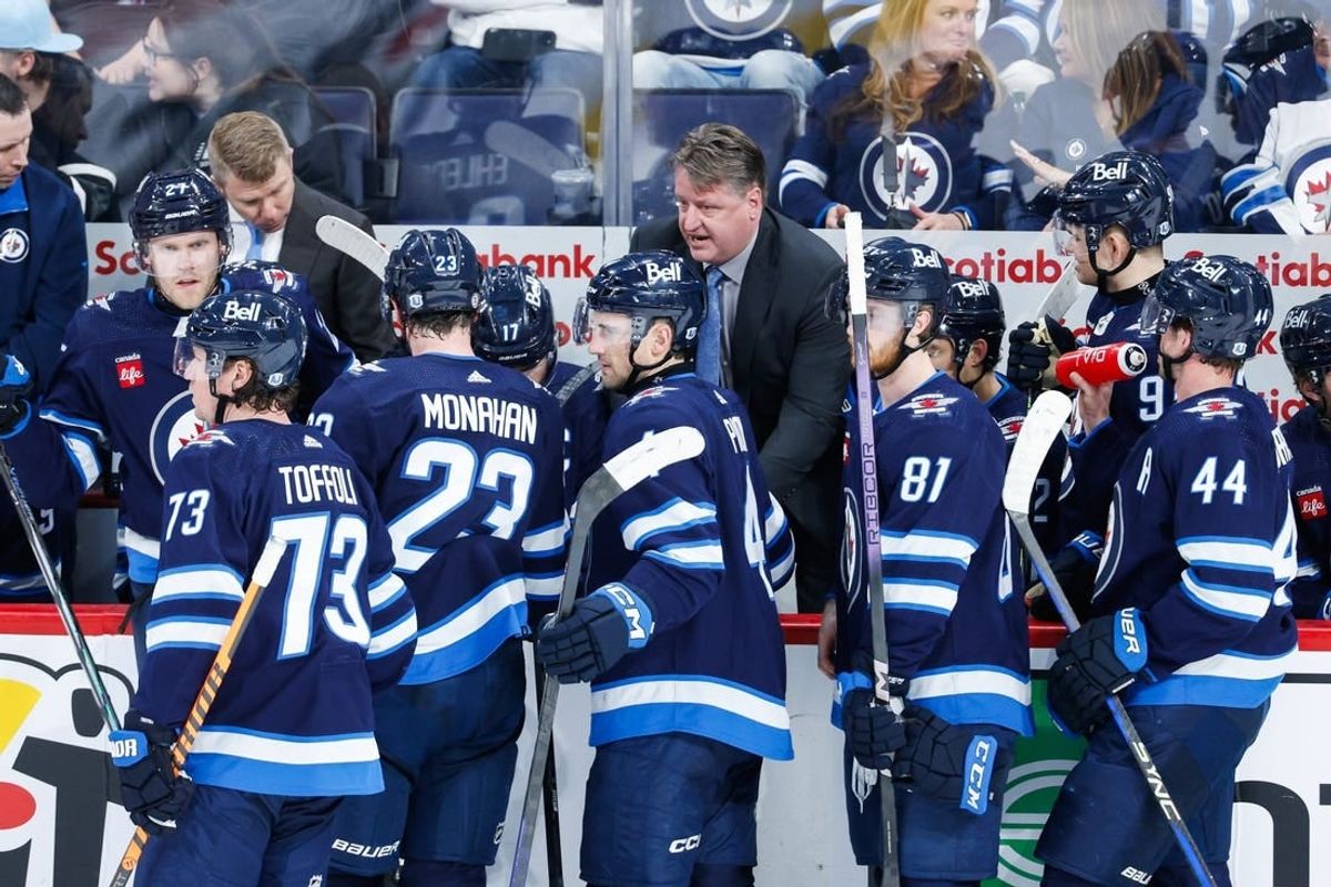 Mar 13, 2024; Winnipeg, Manitoba, CAN; Winnipeg Jets assistant coach Brad Lauer discusses strategy against the Nashville Predators during the third period at Canada Life Centre.