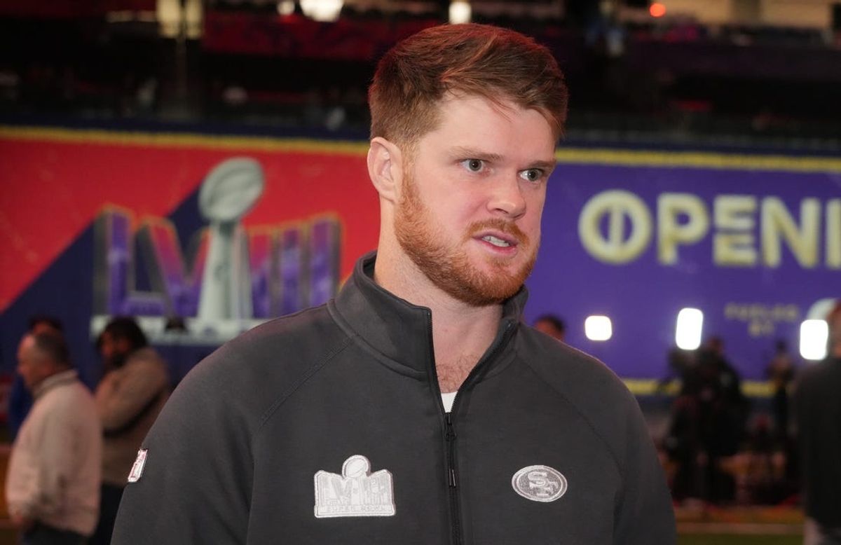 Feb 5, 2024; Las Vegas, NV, USA; San Francisco 49ers quarterback Sam Darnold (14) is interviewed during Super Bowl LVIII Opening Night at Allegiant Stadium. Mandatory Credit: Kirby Lee-USA TODAY Sports