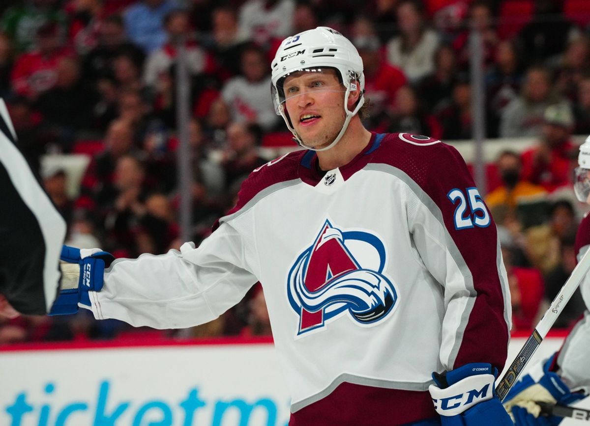 Feb 8, 2024; Raleigh, North Carolina, USA; Colorado Avalanche right wing Logan O'Connor (25) reacts against the Carolina Hurricanes during the third period at PNC Arena. Mandatory Credit: James Guillory-Imagn Images