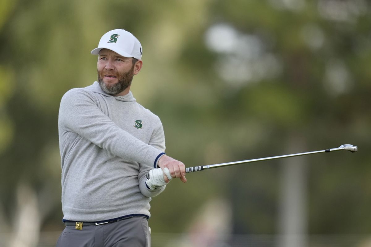 Feb 9, 2024; Las Vegas, Nevada, USA; Branden Grace plays his shot from the 18th green during the second round of the LIV Golf Las Vegas tournament at Las Vegas Country Club. Mandatory Credit: Lucas Peltier-Imagn Images