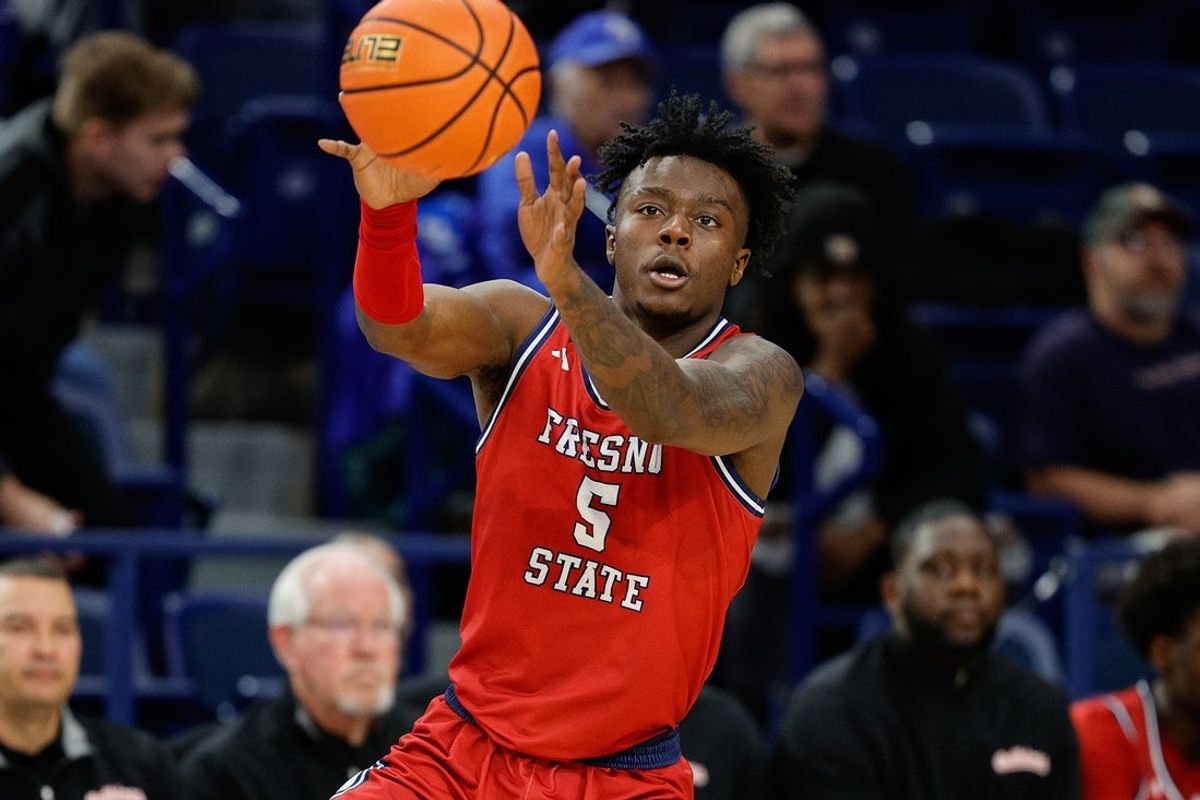 Feb 10, 2024; Colorado Springs, Colorado, USA; Fresno State Bulldogs guard Jalen Weaver (5) controls the ball in the second half against the Air Force Falcons at Clune Arena. Mandatory Credit: Isaiah J. Downing-Imagn Images