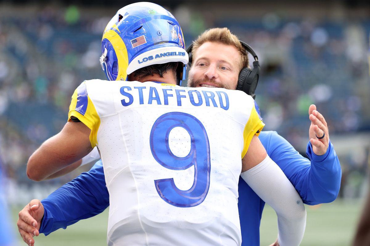 Sean McVay Matthew Stafford celebrate late in a win againtst the Seattle Seahawks at Lumen Field on September 10, 2023 in Seattle, Washington.