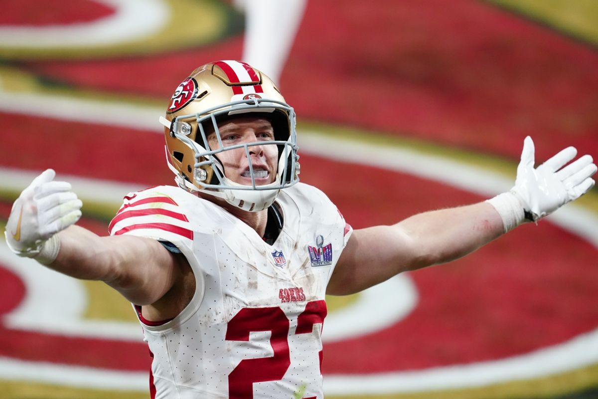 San Francisco 49ers running back Christian McCaffrey (23) celebrates after scoring a touchdown against the Kansas City Chiefs in the first half in Super Bowl LVIII at Allegiant Stadium. Mandatory Credit: Stephen R. Sylvanie-Imagn Images