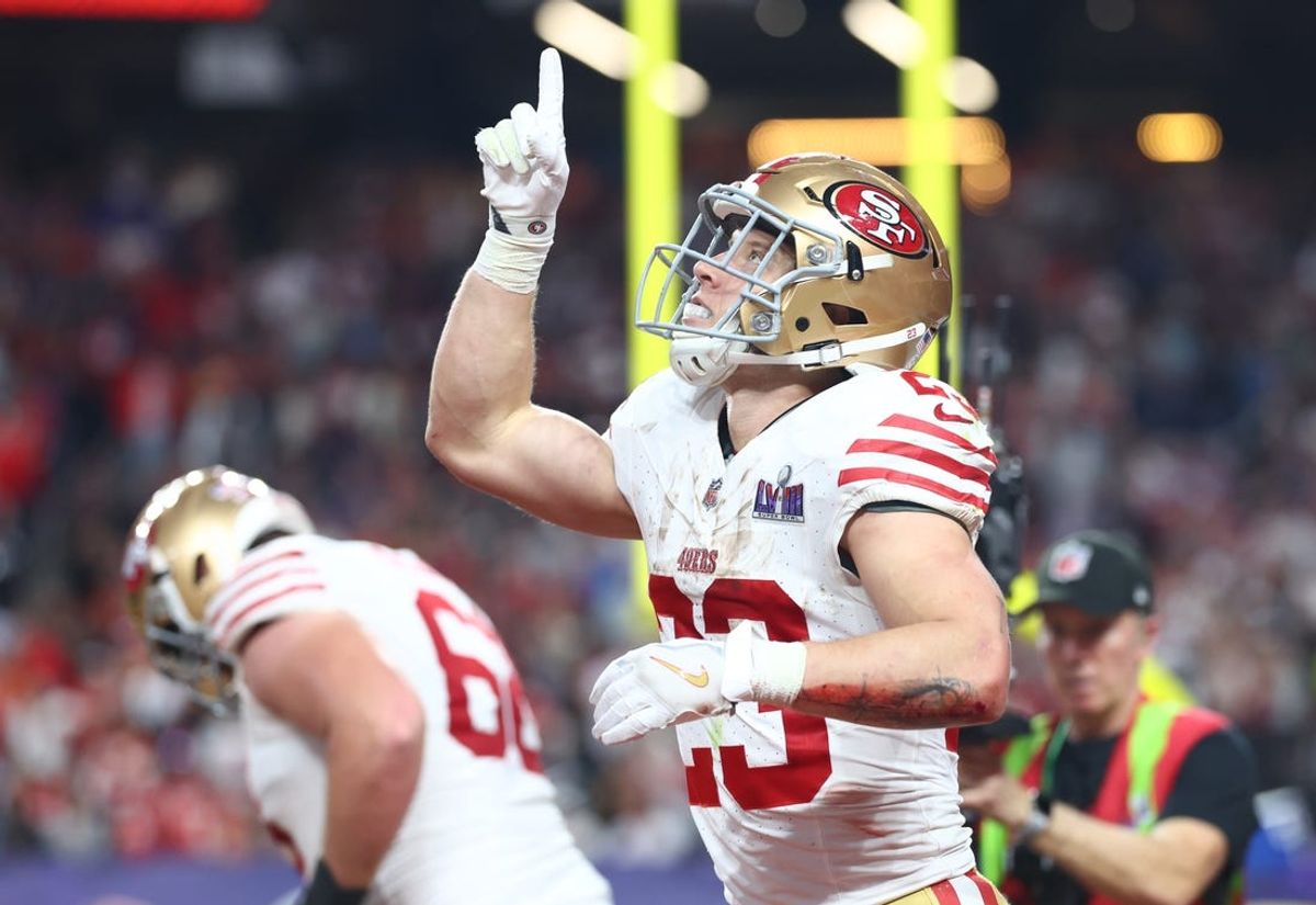 Feb 11, 2024; Paradise, Nevada, USA; San Francisco 49ers running back Christian McCaffrey (23) scores a touchdown against the Kansas City Chiefs in the first half of Super Bowl LVIII at Allegiant Stadium. Mandatory Credit: Mark J. Rebilas-USA TODAY Sports