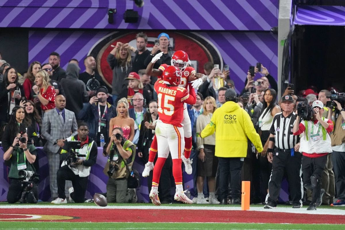 Kansas City Chiefs wide receiver Mecole Hardman Jr. (12) celebrates with quarterback Patrick Mahomes (15) after a game winning catch for a touchdown against the San Francisco 49ers during overtime of Super Bowl LVIII at Allegiant Stadium. Mandatory Credit: Kyle Terada-USA TODAY Sports