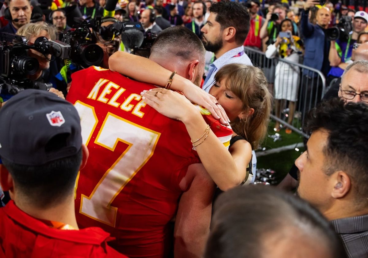 Feb 11, 2024; Paradise, Nevada, USA; Kansas City Chiefs tight end Travis Kelce (87) celebrates with girlfriend Taylor Swift after defeating the San Francisco 49ers in Super Bowl LVIII at Allegiant Stadium. Mandatory Credit: Mark J. Rebilas-Imagn Images