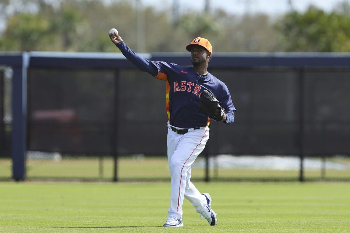 Feb 14, 2024; West Palm Beach, FL, USA; Houston Astros relief pitcher Oliver Ortega (63) works out during spring training at CACTI Park of the Palm Beaches. Mandatory Credit: Sam Navarro-USA TODAY Sports
