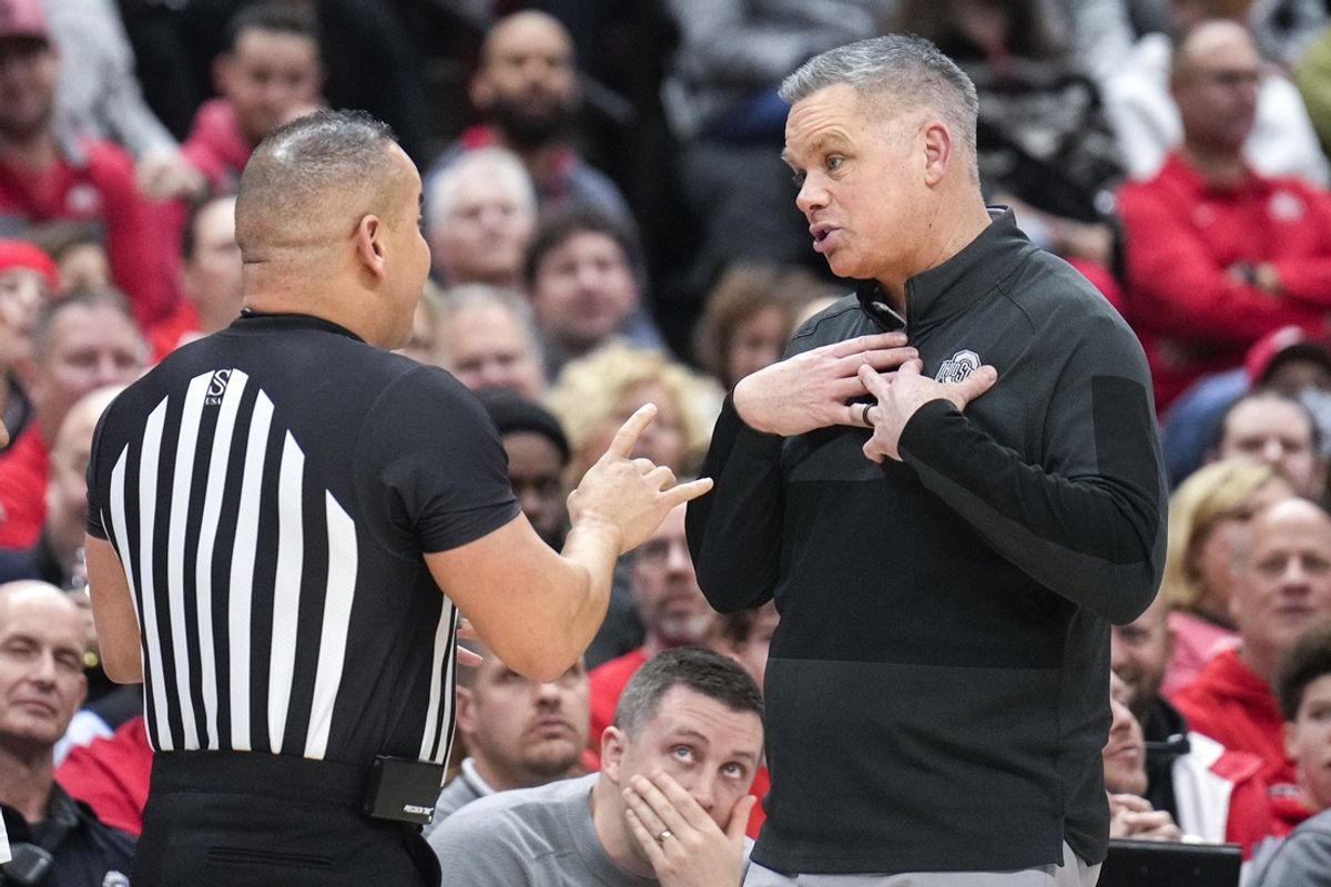 Dec 21, 2022; Columbus, Ohio, United States; Ohio State Buckeyes head coach Chris Holtmann speaks with a referee during the second half of the NCAA division I basketball game at Value City Arena on Wednesday night. Mandatory Credit: Joseph Scheller-The Columbus Dispatch