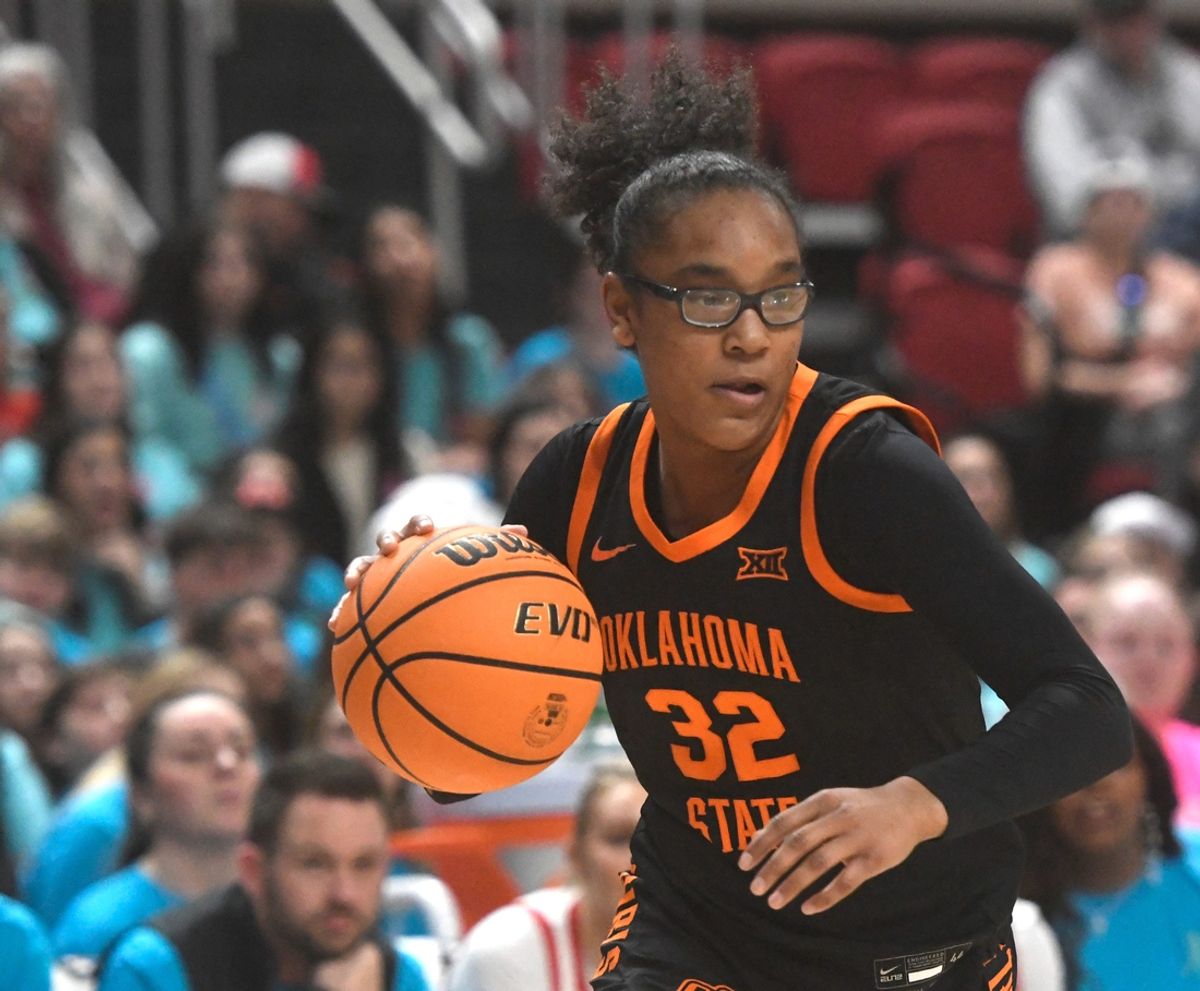 Oklahoma State guard Stailee Heard (32) dribbles the ball against Texas Tech in a Big 12 basketball game, Wednesday, Feb. 14, 2024, at United Supermarkets Arena.