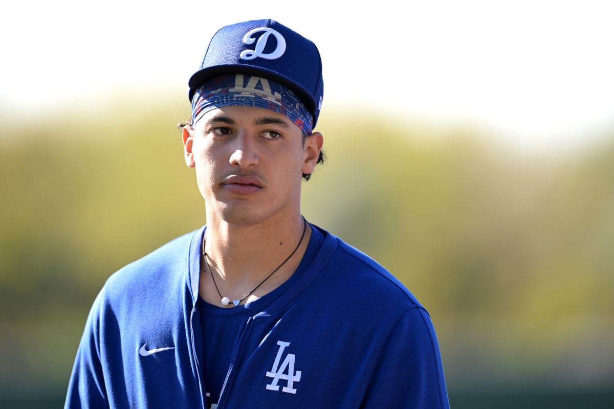 Feb 17, 2024; Glendale, AZ, USA;  Los Angeles Dodgers catcher Diego Cartaya (76) looks on during spring training at Camelback Ranch. Mandatory Credit: Jayne Kamin-Oncea-Imagn Images