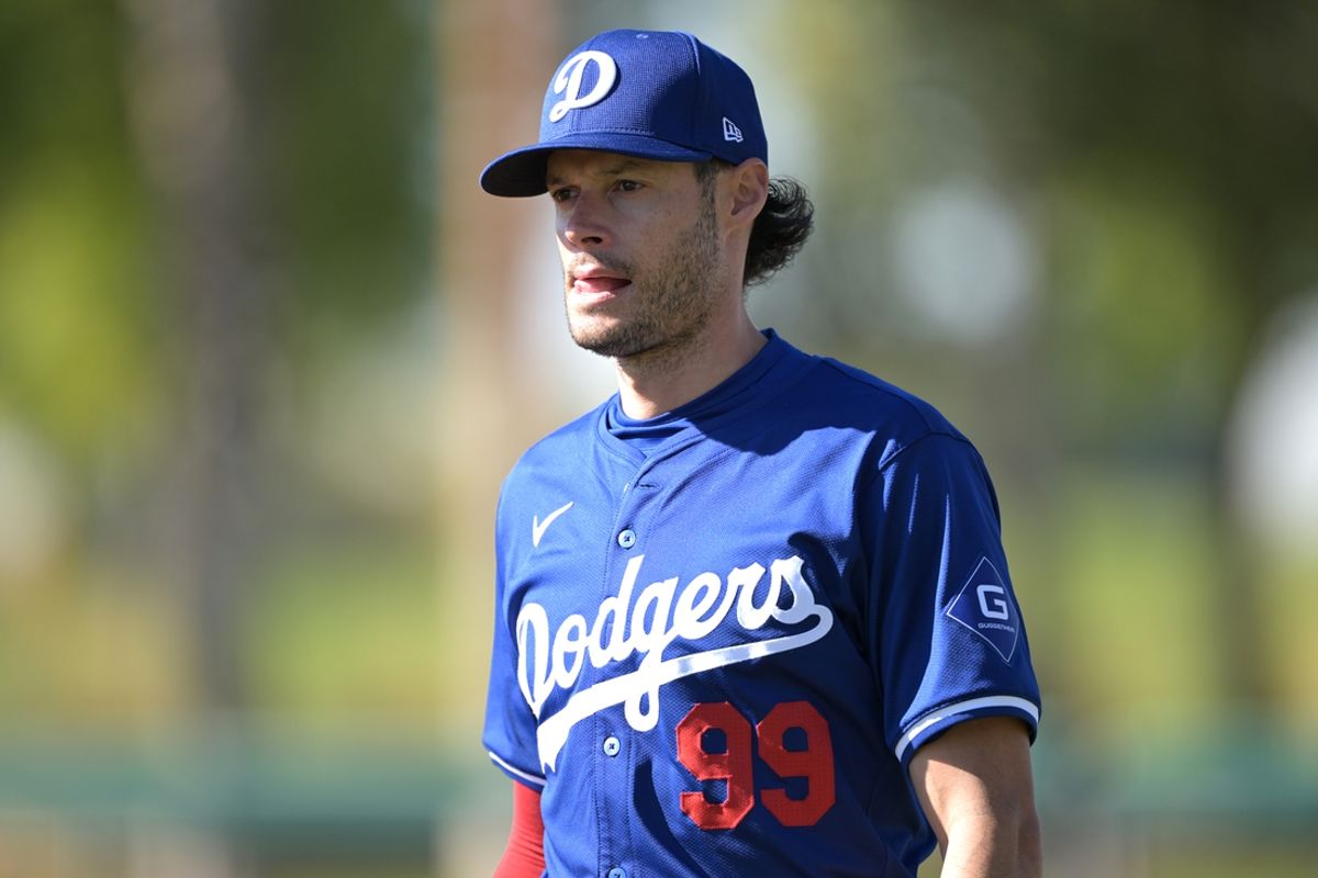 Feb 17, 2024; Glendale, AZ, USA;  Los Angeles Dodgers relief pitcher Joe Kelly (99) looks on during spring training at Camelback Ranch. Mandatory Credit: Jayne Kamin-Oncea-USA TODAY Sports