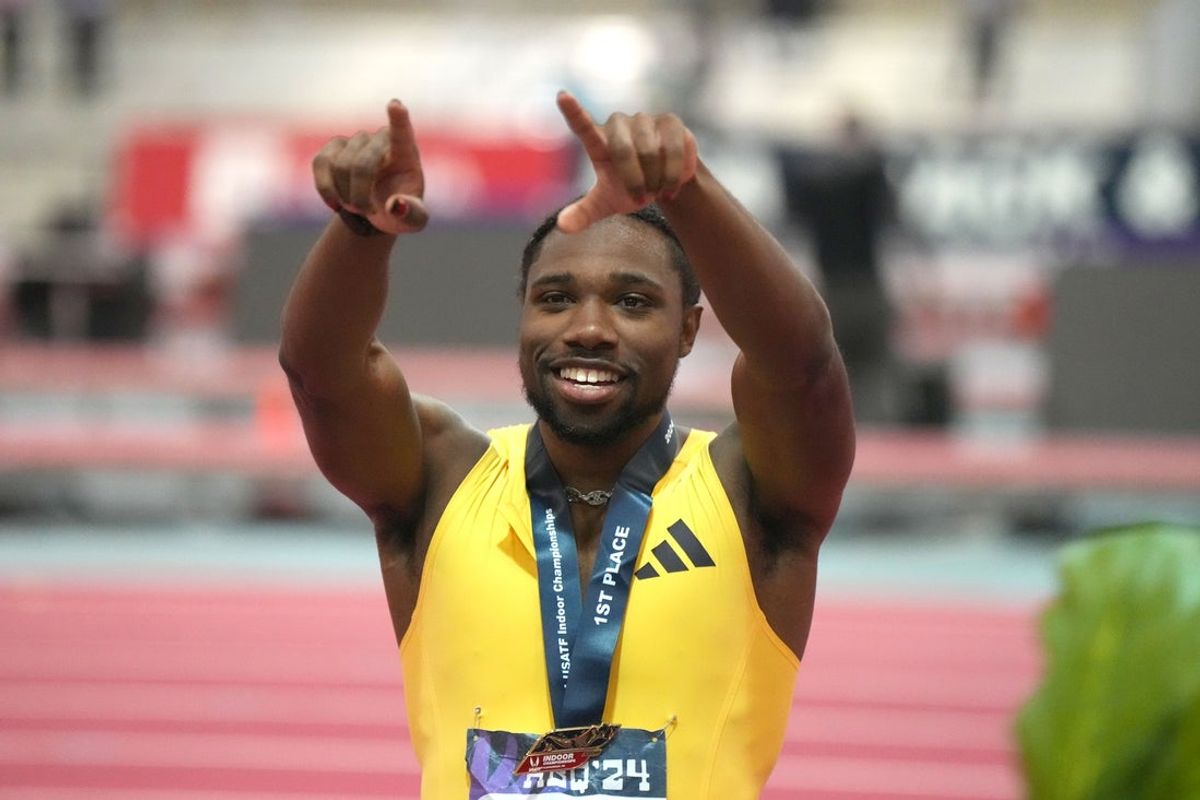 Feb 17, 2024; Albuquerque, NM, USA; Noah Lyles gestures after winning the 60m in 6.43 during the USATF Indoor Championships at Albuquerque Convention Center. Mandatory Credit: Kirby Lee-Imagn Images
