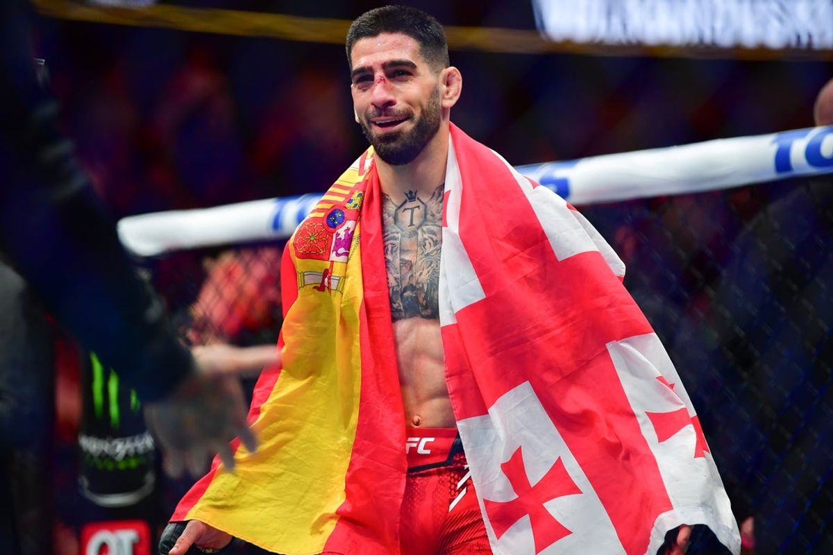 Feb 17, 2024; Anaheim, California, USA; Ilia Topuria celebrates his championship victory against Alexander Volkanovski during UFC 298 at Honda Center. Mandatory Credit: Gary A. Vasquez-USA TODAY Sports