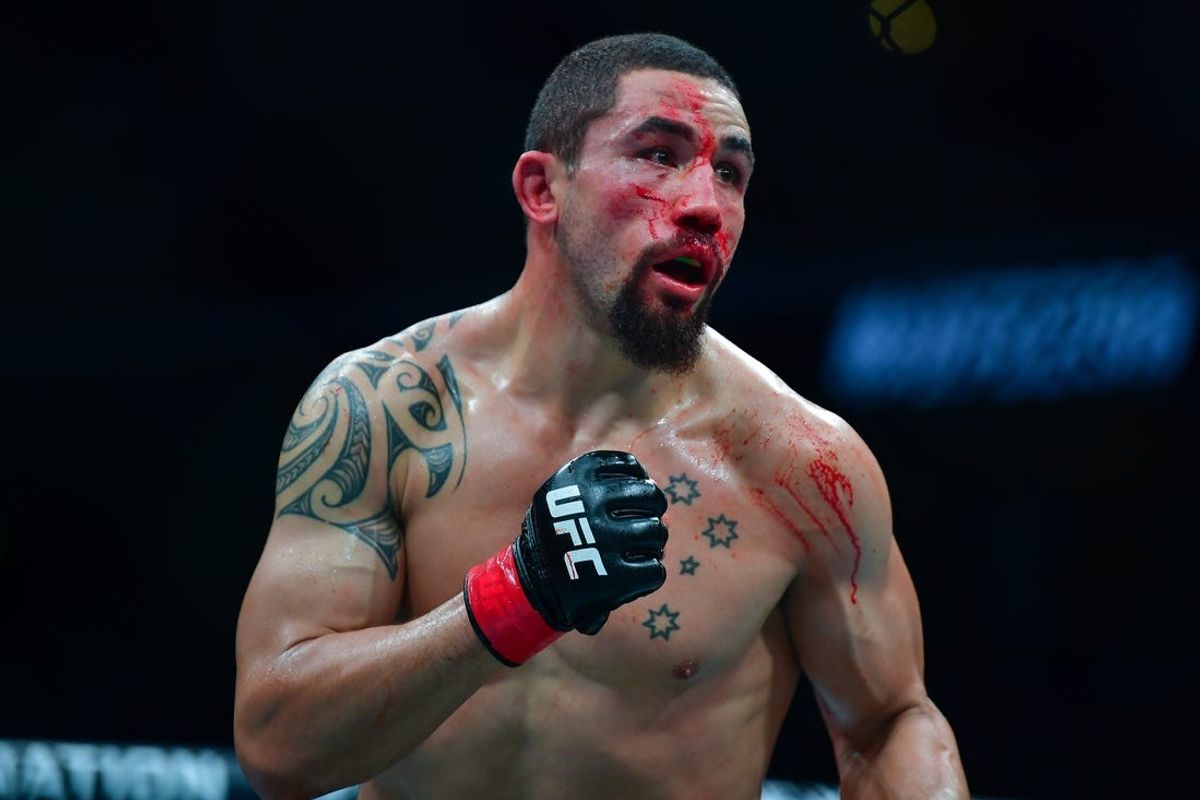 Feb 17, 2024; Anaheim, California, USA; Robert Whittaker fights against Paulo Costa during UFC 298 at Honda Center. Mandatory Credit: Gary A. Vasquez-USA TODAY Sports