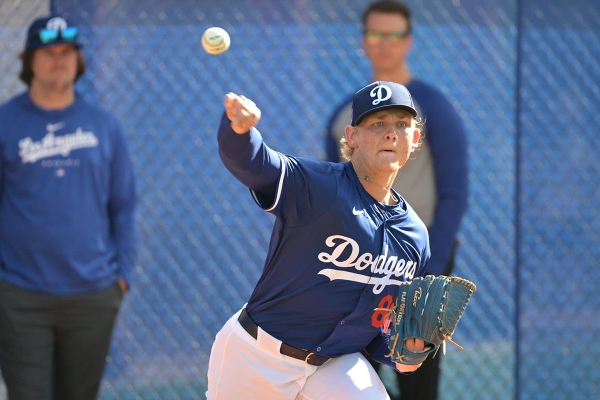 Feb 18, 2024; Glendale, AZ, USA;  Los Angeles Dodgers starting pitcher Emmet Sheehan (80) throws in the bullpen during workouts at spring training at Camelback Ranch. Mandatory Credit: Jayne Kamin-Oncea-USA TODAY Sports
