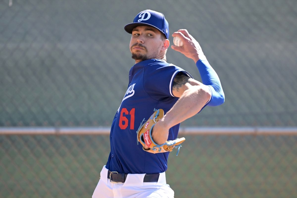 Feb 18, 2024; Glendale, AZ, USA;  Los Angeles Dodgers relief pitcher Ricky Vanasco (61) throws in the bullpen at spring training at Camelback Ranch. Mandatory Credit: Jayne Kamin-Oncea-USA TODAY Sports