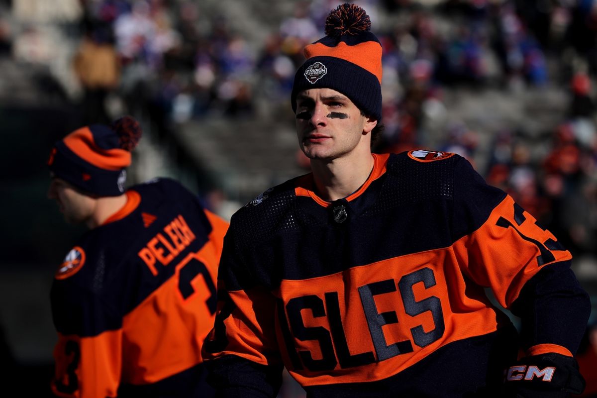 Feb 18, 2024; East Rutherford, New Jersey, USA; New York Islanders center Mathew Barzal (13) and defenseman Adam Pelech (3) warm up before a Stadium Series ice hockey game against the New York Rangers at MetLife Stadium. Mandatory Credit: Brad Penner-Imagn Images