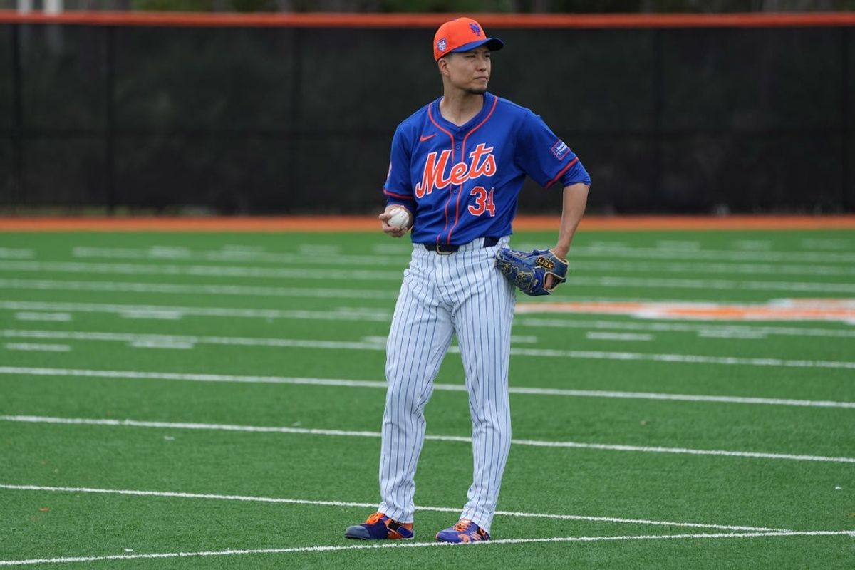 Feb 19, 2024; Port St. Lucie, FL, USA; New York Mets starting pitcher Kodai Senga (34) warms-up during workouts at spring training. Mandatory Credit: Jim Rassol-USA TODAY Sports