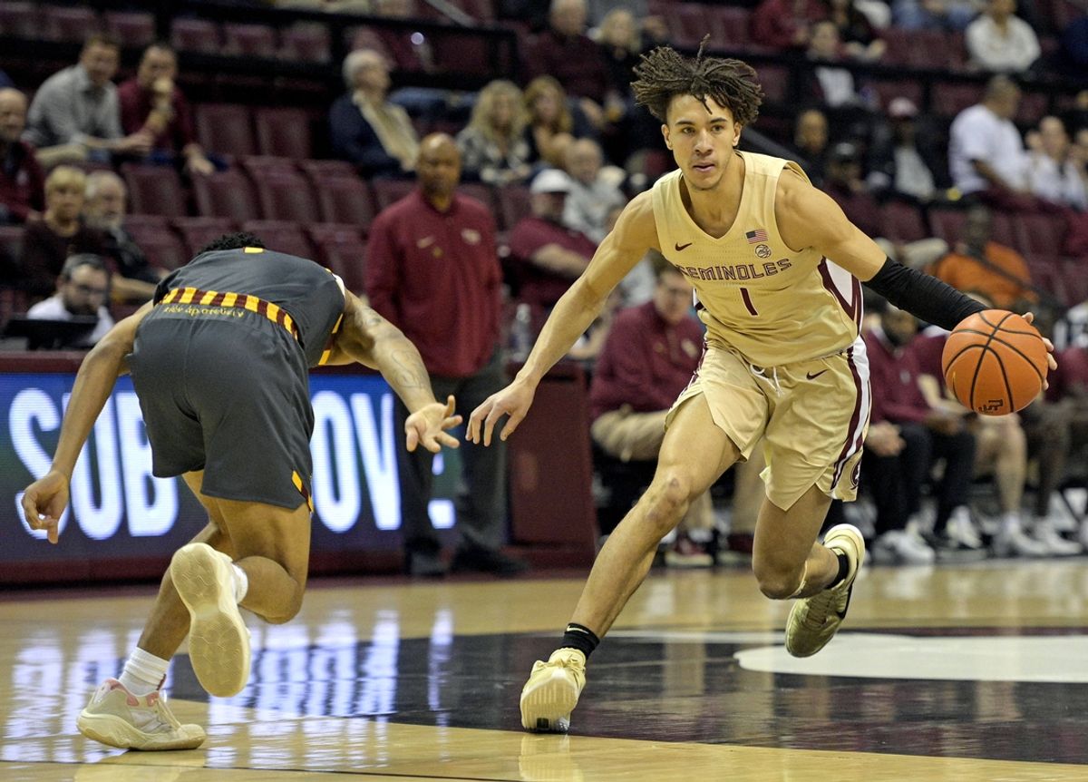 Feb 20, 2024; Tallahassee, Florida, USA; Florida State Seminoles guard Jalen Warley (1) moves the ball up the court against the Boston College Eagles in the first half at Donald L. Tucker Center. Mandatory Credit: Melina Myers-Imagn Images