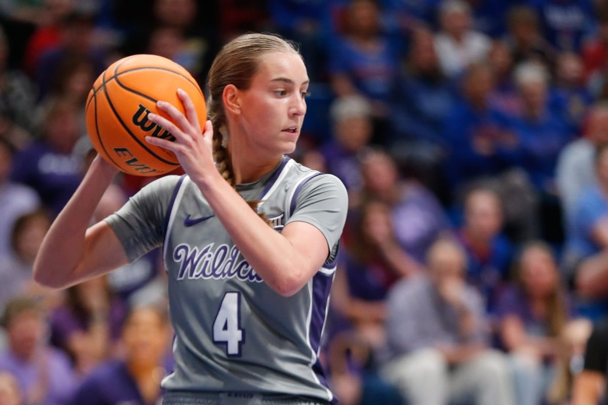 Kansas State junior guard Serena Sundell (4) grabs a rebound in the first half of the Sunflower Showdown game against Kansas Sunday, Feb. 25, 2024 inside Allen Fieldhosue.
