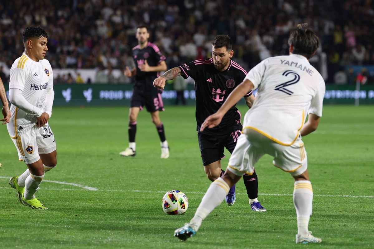 Feb 25, 2024; Carson, California, USA;  Inter Miami CF forward Lionel Messi (10) dribbles the ball against the LA Galaxy during the second half at Dignity Health Sports Park. Mandatory Credit: Kiyoshi Mio-Imagn Images
