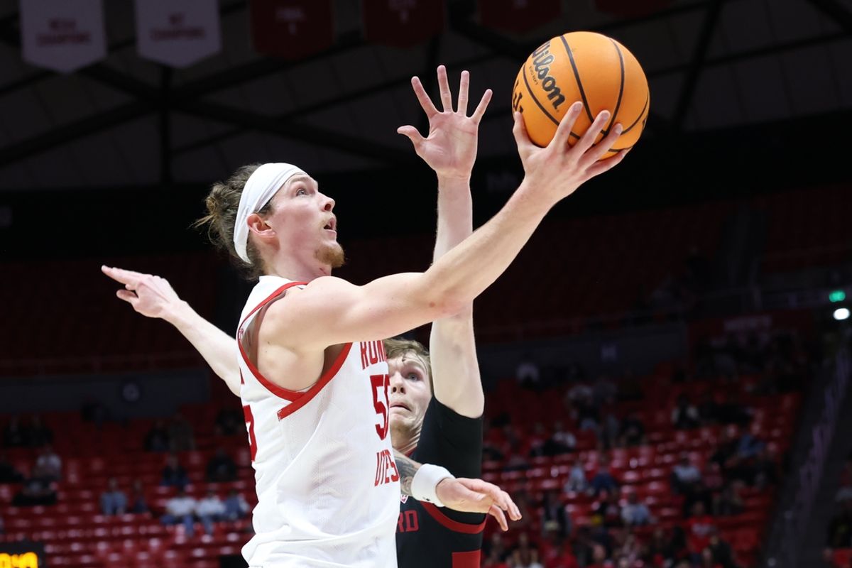 Feb 29, 2024; Salt Lake City, Utah, USA; Utah Utes guard Gabe Madsen (55) lays the ball up against the Stanford Cardinal during the second half at Jon M. Huntsman Center. Mandatory Credit: Rob Gray-Imagn Images