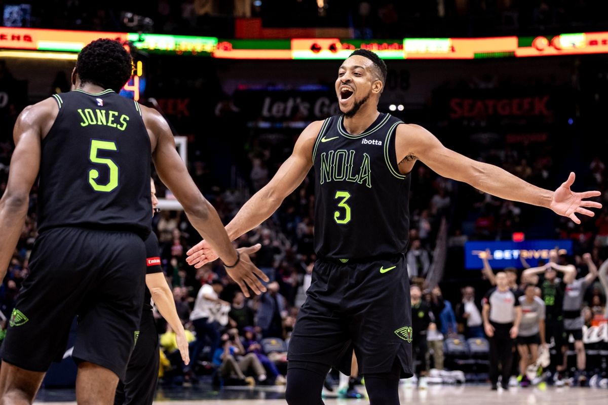 Mar 1, 2024; New Orleans, Louisiana, USA;  New Orleans Pelicans guard CJ McCollum (3) celebrates with forward Herbert Jones (5) after he is fouled by the Indiana Pacers during the second half at Smoothie King Center. Mandatory Credit: Stephen Lew-Imagn Images