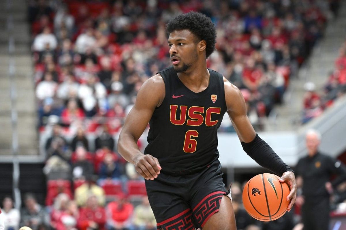Feb 29, 2024; Pullman, Washington, USA; USC Trojans guard Bronny James (6) controls the ball against the Washington State Cougars in the first half at Friel Court at Beasley Coliseum. Mandatory Credit: James Snook-USA TODAY Sports