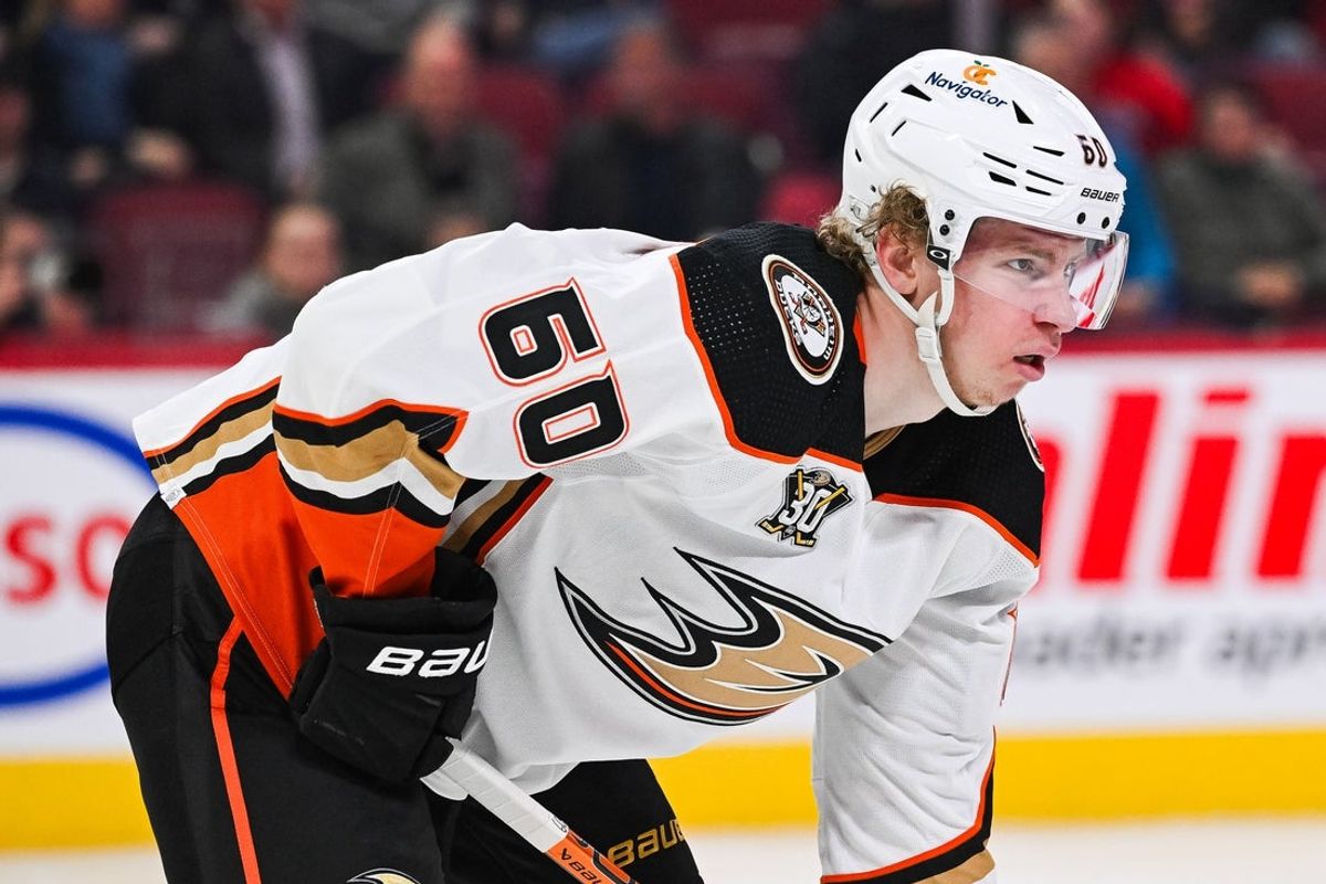 Feb 13, 2024; Montreal, Quebec, CAN; Anaheim Ducks defenseman Jackson LaCombe (60) waits for a face-off  against the Montreal Canadiens during the second period at Bell Centre. Mandatory Credit: David Kirouac-Imagn Images