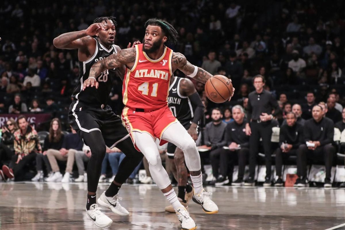 Mar 2, 2024; Brooklyn, New York, USA; Atlanta Hawks forward Saddiq Bey (41) drives past Brooklyn Nets forward Dorian Finney-Smith (28) in the first quarter at Barclays Center. Mandatory Credit: Wendell Cruz-USA TODAY Sports