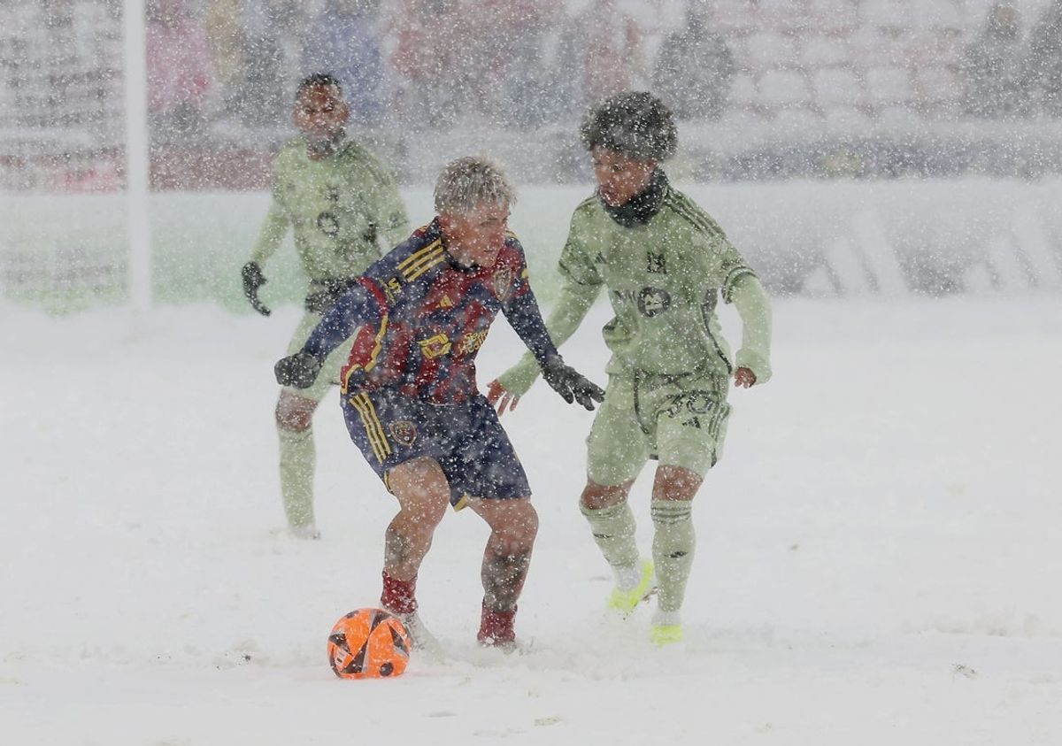 Mar 2, 2024; Sandy, Utah, USA; Real Salt Lake midfielder Diego Luna (8) battles for the ball with LAFC forward David Martinez (30) at America First Field. Mandatory Credit: Rob Gray-Imagn Images