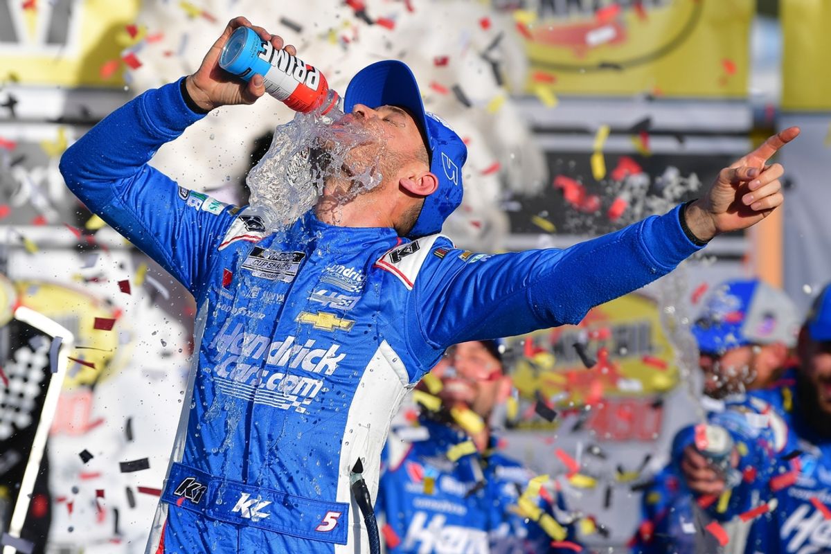 Mar 3, 2024; Las Vegas, Nevada, USA; NASCAR Cup Series driver Kyle Larson (5) celebrates his victory of the Pennzoil 400 at Las Vegas Motor Speedway. Mandatory Credit: Gary A. Vasquez-Imagn Images