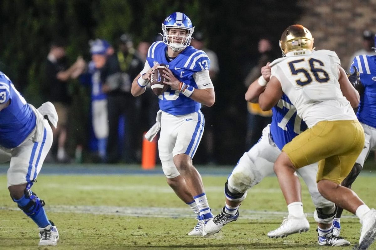 Sep 30, 2023; Durham, North Carolina, USA;Duke Blue Devils quarterback Riley Leonard (13) looks for a receiver  during the second half against the Notre Dame Fighting Irish at Wallace Wade Stadium.
