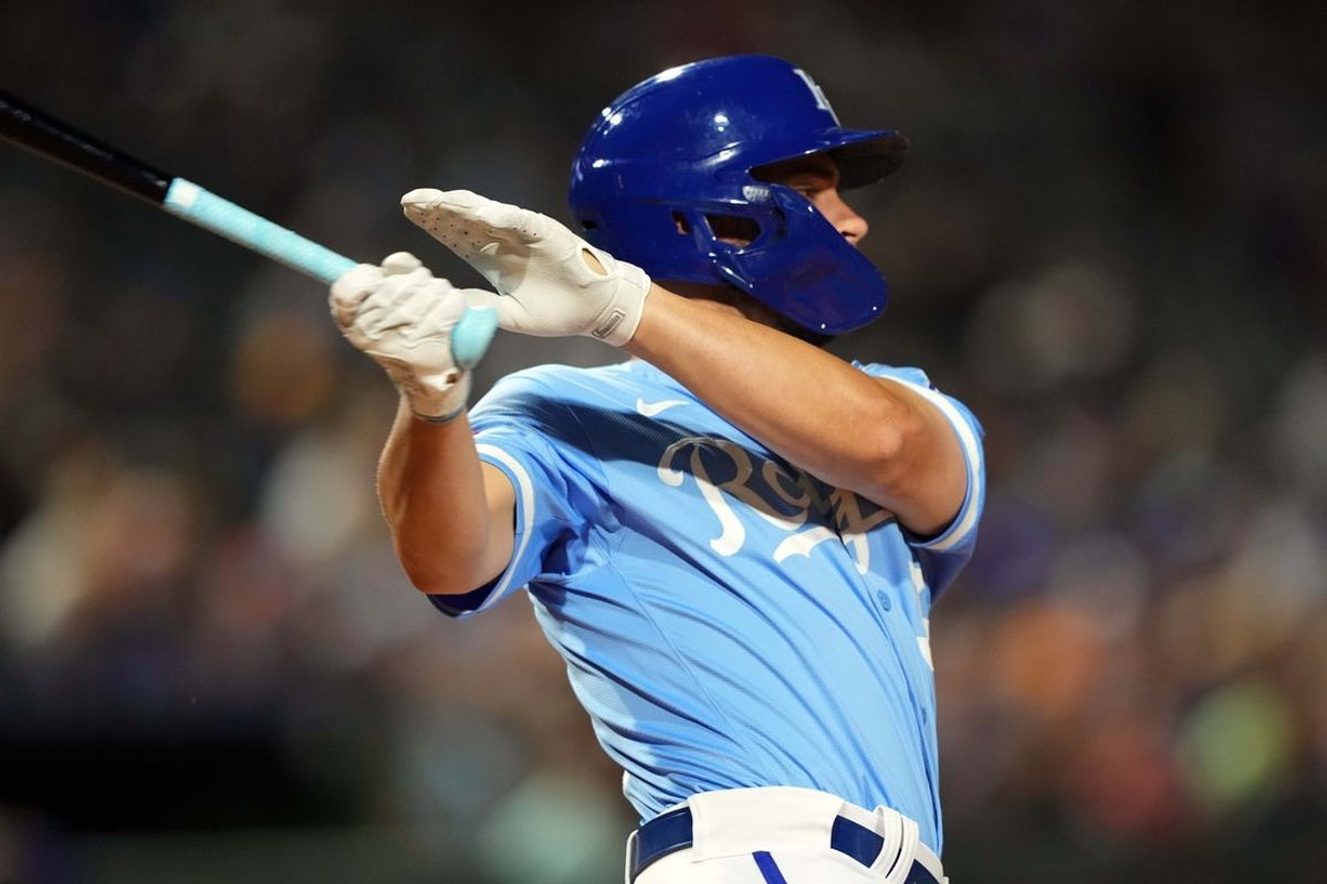Mar 5, 2024; Surprise, Arizona, USA; Kansas City Royals left fielder John Rave (96) bats against the Chicago Cubs during the third inning at Surprise Stadium. Mandatory Credit: Joe Camporeale-Imagn Images