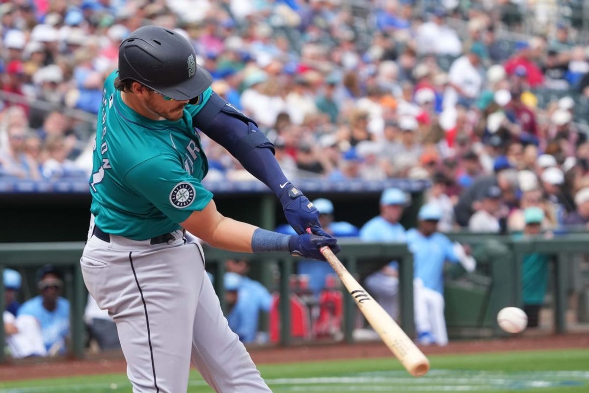 Mar 6, 2024; Surprise, Arizona, USA; Seattle Mariners right fielder Brian Anderson (27) bats Kansas City Royals during the second inning at Surprise Stadium. Mandatory Credit: Joe Camporeale-USA TODAY Sports