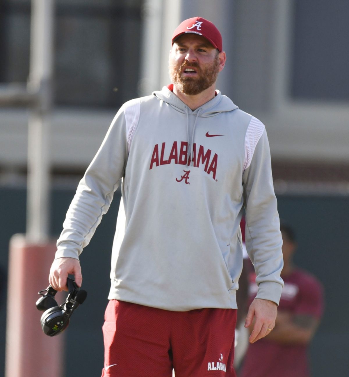 Mar 6, 2024; Tuscaloosa, Alabama, USA; Co-defensive coordinator Colin Hitschler works with defensive players during practice of the Alabama Crimson Tide football team Wednesday.