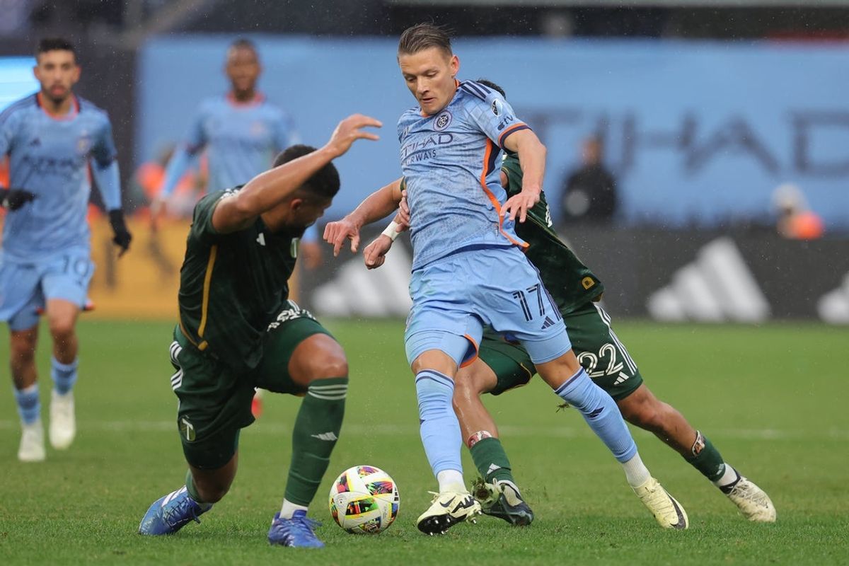 Mar 9, 2024; New York, New York, USA; New York Red Bulls defender Cameron Harper (17) reaches for the ball against the Portland Timbers during the first half at Yankee Stadium. Mandatory Credit: Brad Penner-Imagn Images