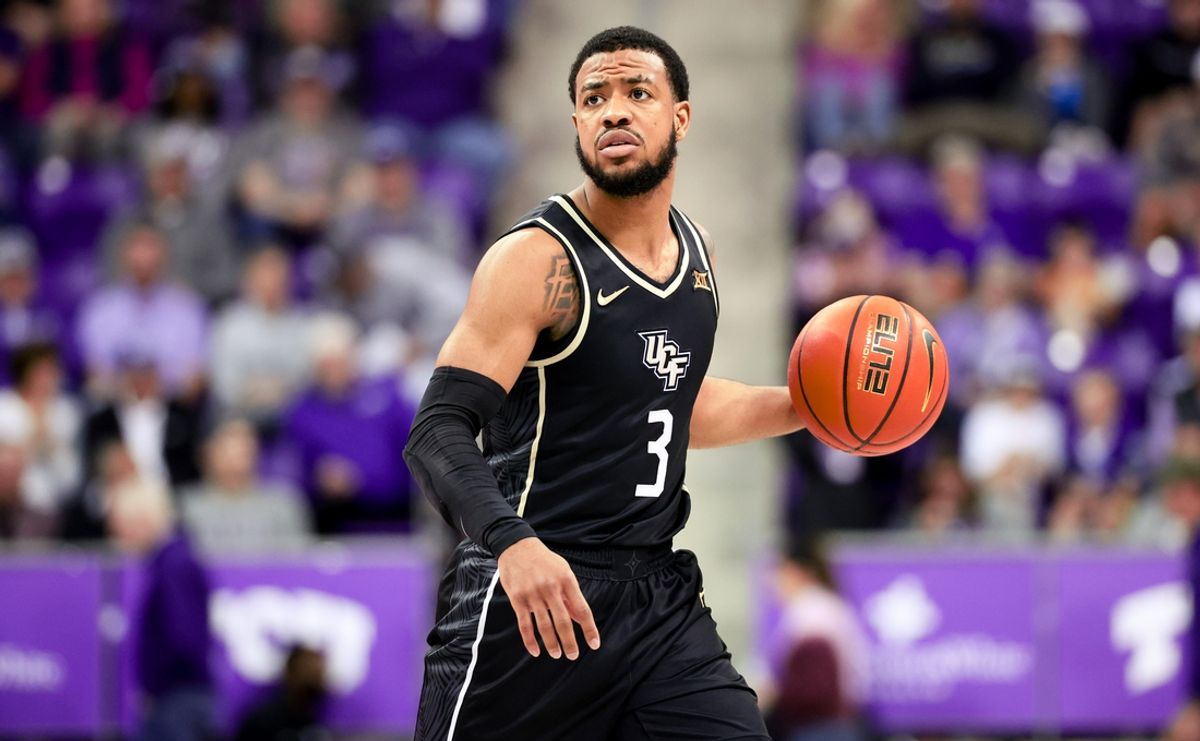 Mar 9, 2024; Fort Worth, Texas, USA; UCF Knights guard Darius Johnson (3) controls the ball during the second half against the TCU Horned Frogs at Ed and Rae Schollmaier Arena. Mandatory Credit: Kevin Jairaj-Imagn Images