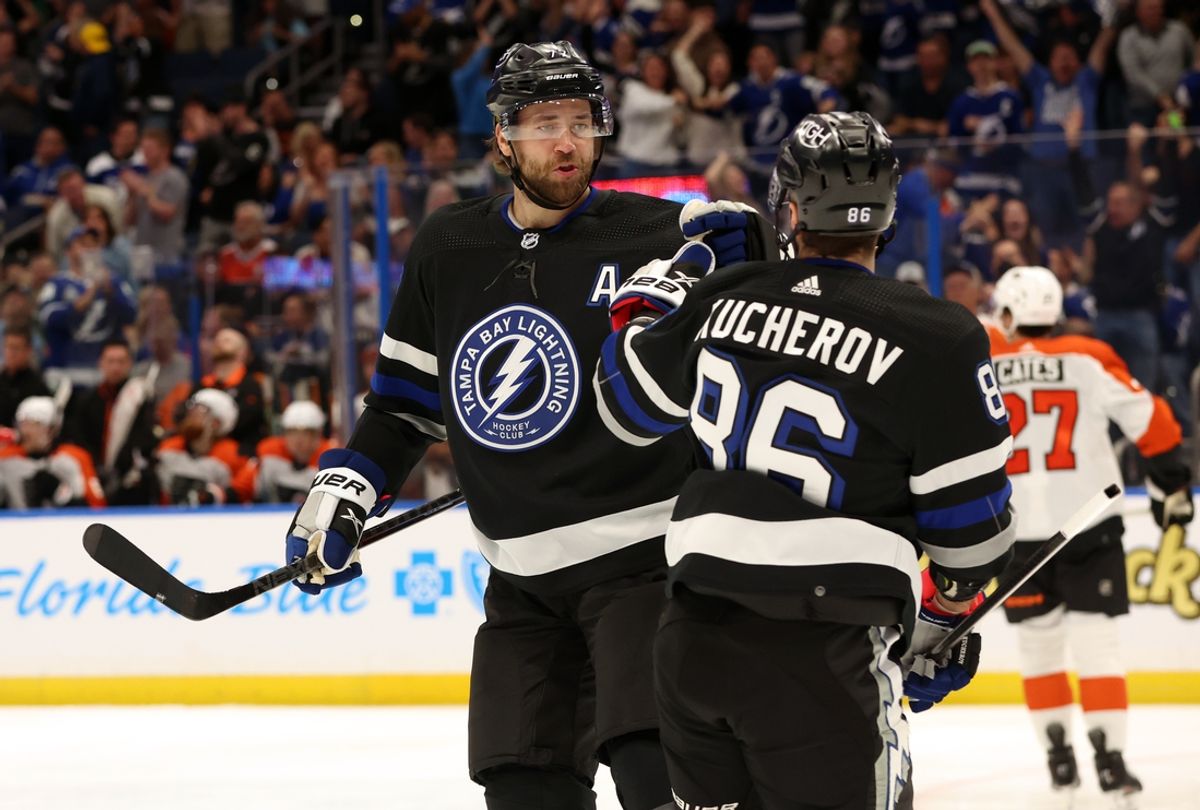 Mar 9, 2024; Tampa, Florida, USA; Tampa Bay Lightning defenseman Victor Hedman (77) is congratulated by right wing Nikita Kucherov (86) after he scored a goal against the Philadelphia Flyers during the first period at Amalie Arena. Mandatory Credit: Kim Klement Neitzel-Imagn Images