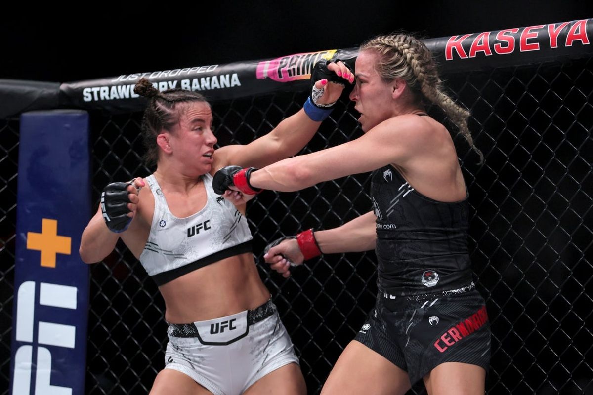 Mar 9, 2024; Miami, Florida, USA; Maycee Barber (blue gloves) fights Katlyn Cerminara (red gloves) during UFC 299 at Kayesa Center. Mandatory Credit: Sam Navarro-Imagn Images