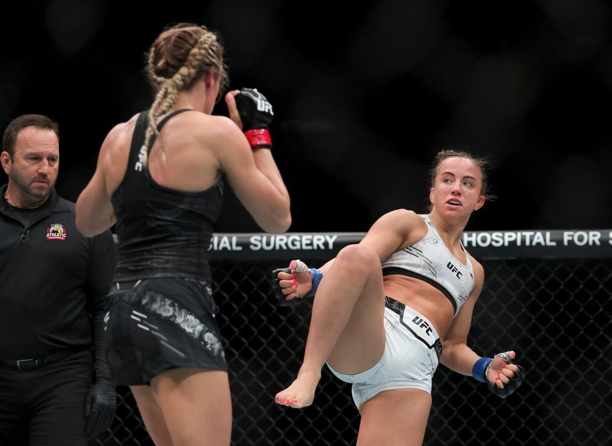Mar 9, 2024; Miami, Florida, USA; Maycee Barber (blue gloves) fights Katlyn Cerminara (red gloves) during UFC 299 at Kayesa Center. Mandatory Credit: Sam Navarro-Imagn Images