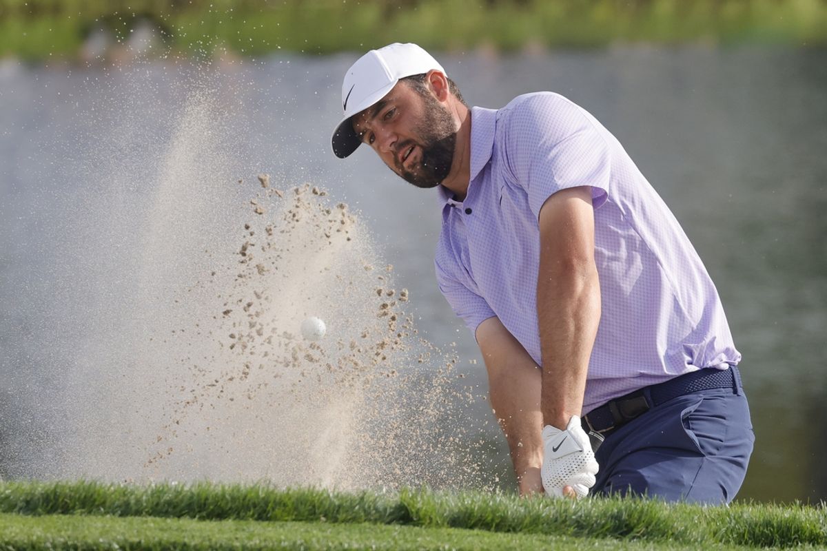 Mar 10, 2024; Orlando, Florida, USA;  Scottie Scheffler hits from the bunker on the 17th hole during the final round of the Arnold Palmer Invitational golf tournament. Mandatory Credit: Reinhold Matay-Imagn Images